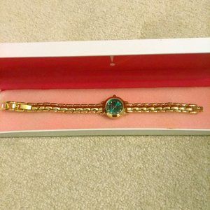 NIB Goldtone watch with emerald face